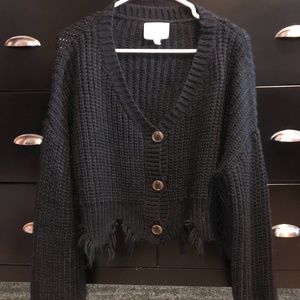 Raw-edge black sweater